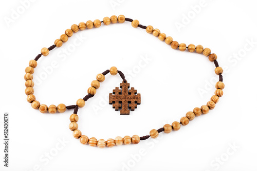 Traditional wooden christian holy religious rosary isolated on white background