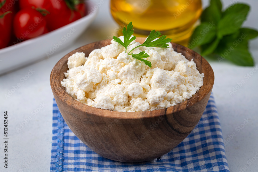 Curd cheese in wooden bowl (Turkish name; lor peyniri) Curd cheese in wooden bowl (Turkish name; lor peyniri)
