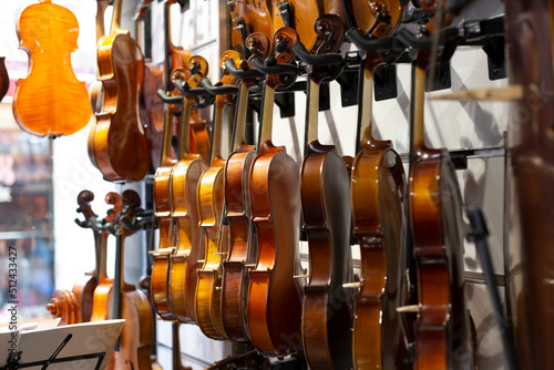 Showcase with violins in music store