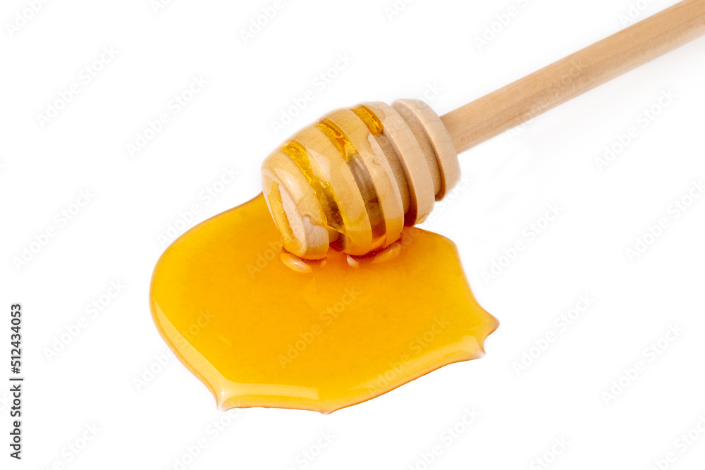 Honey with honey dipper isolated on white background.