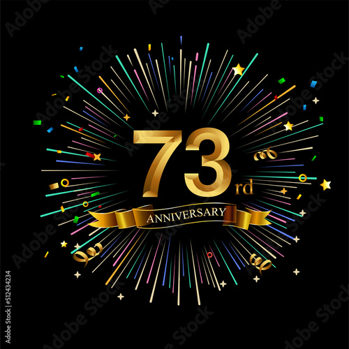 73rd Anniversary celebration. Golden number 73rd with sparkling confetti photo