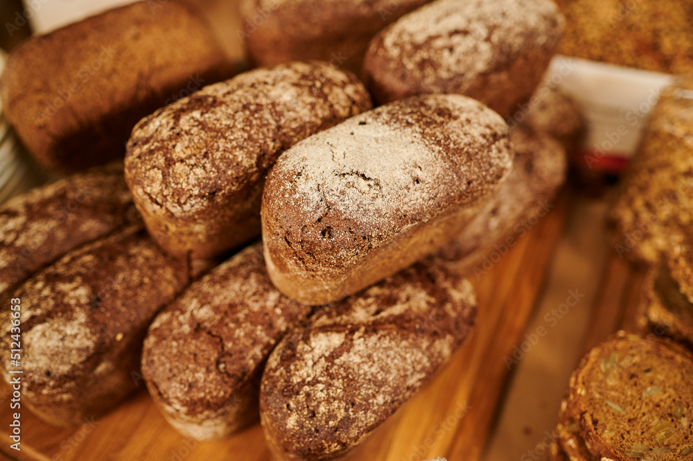 Freshly baked bread on the counter in a bakery Freshly baked bread on the counter in a bakery