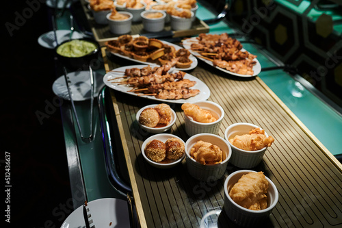 meat in batter and beef on the catering table in the restaurant © Andrey