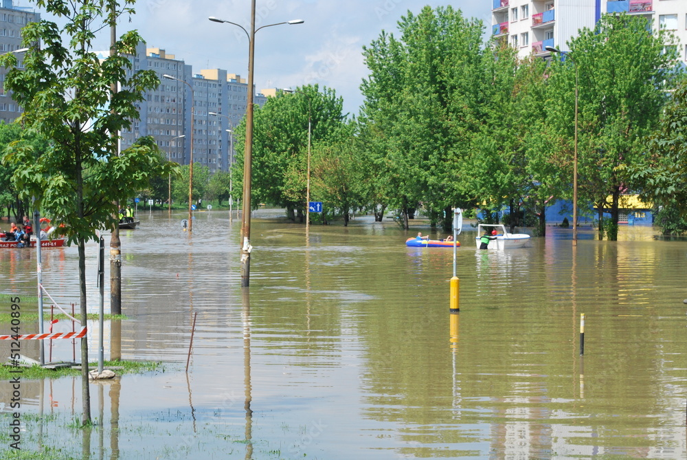 Wrocław, Kozanów housing estate, flood of May 2010. You can see residential buildings, water on the street, flooded city. - obrazy, fototapety, plakaty 