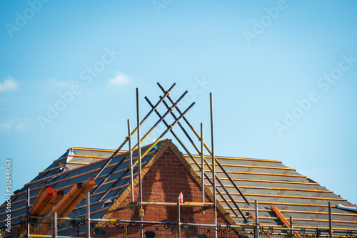 new built houses over clear blue sky in england uk