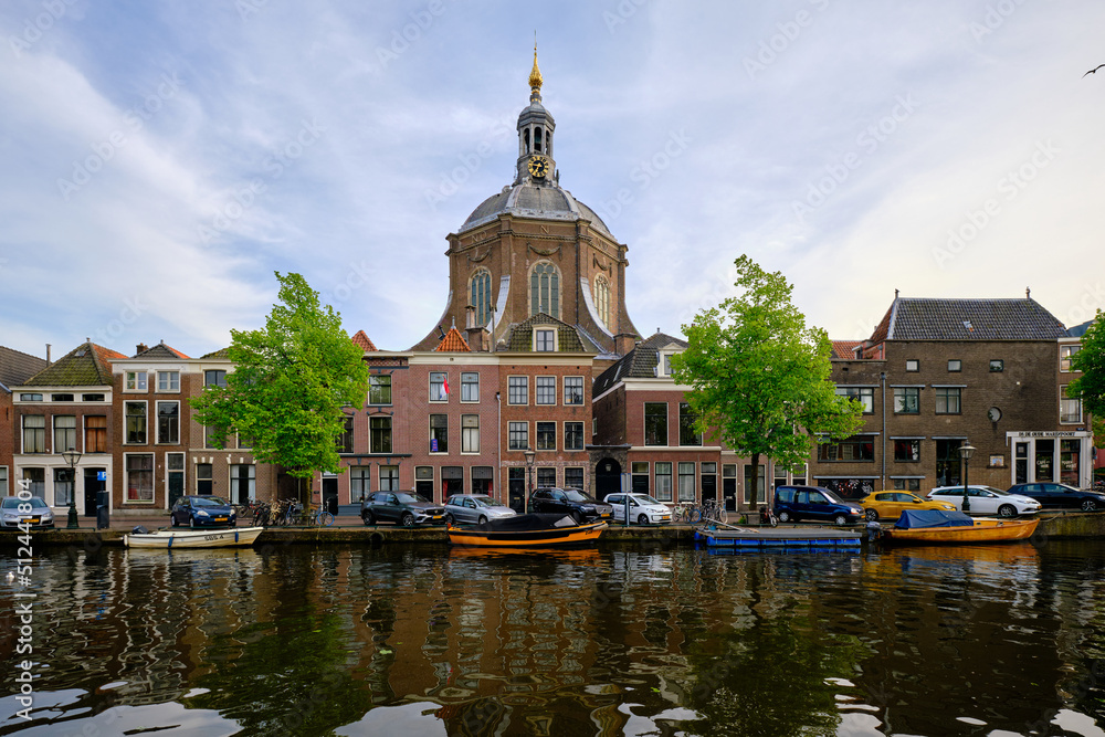 Leiden, The Netherlands 09 May 2022. The Oude Vest canal, traditional houses and Marekerk Protestant church.
