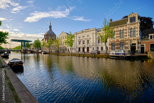 Leiden, The Netherlands 09 May 2022. The Oude Vest canal, traditional houses and Marekerk Protestant church.
