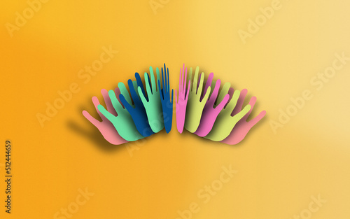 Hand Symbol in Multi Colors is Paper Crafted on Paper Yellow Background