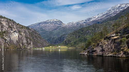 Fjord, mountains and village