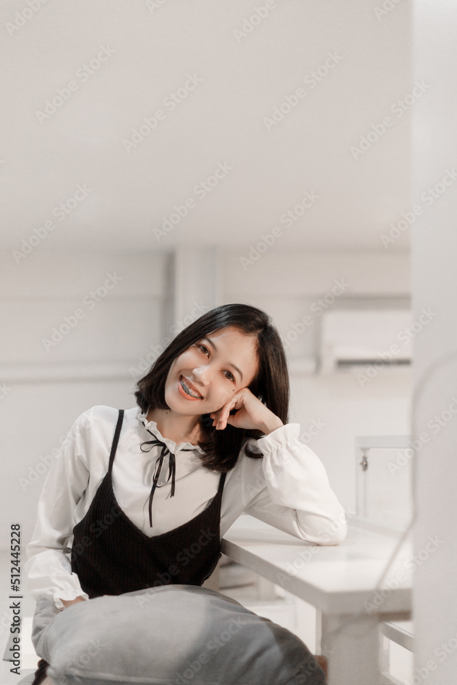 Smiling attractive young business Asian woman short hair. Smiling attractive young business Asian woman short hair.