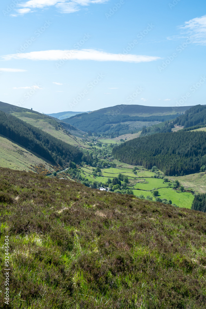Looking down a valley towards a town in Wicklow National Park