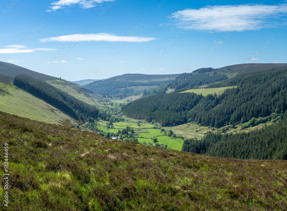 Looking down a valley towards a town in Wicklow National Park