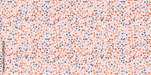 Polka dot vector seamless pattern. Irregular chaotic small colorful spots, circles. Cute funky background in pink, blue and orange color. Simple abstract texture. Repeat design for decor, wallpapers