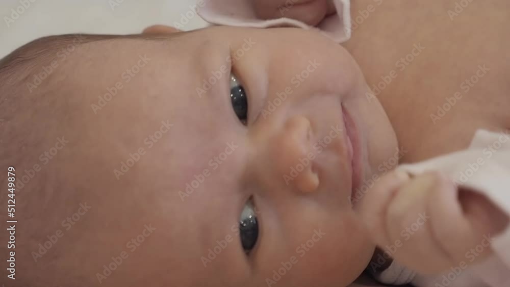 Portrait of caucasian cute little infant girl. healthy one month baby vertical Portrait of caucasian cute little infant girl. healthy one month baby vertical