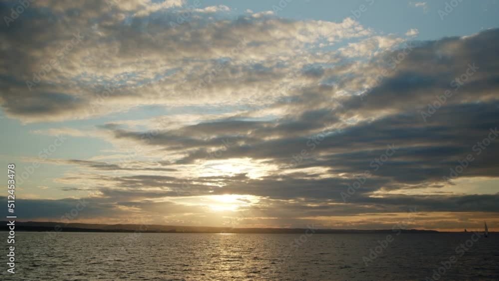 Beautiful sunset with clouds and sea with beach time lapse. Beautiful sunset with clouds and sea with beach time lapse.