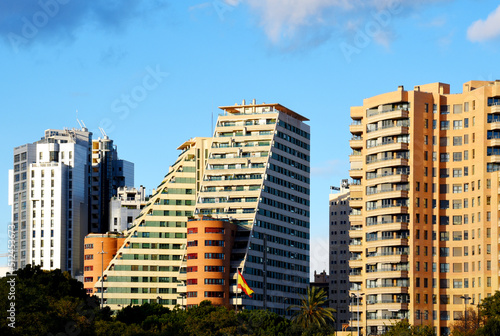 Facade of a building. Residential building with balconies and windows. Colorful buildings apartments. House with window and balcony. Buildings architecture in Europe..