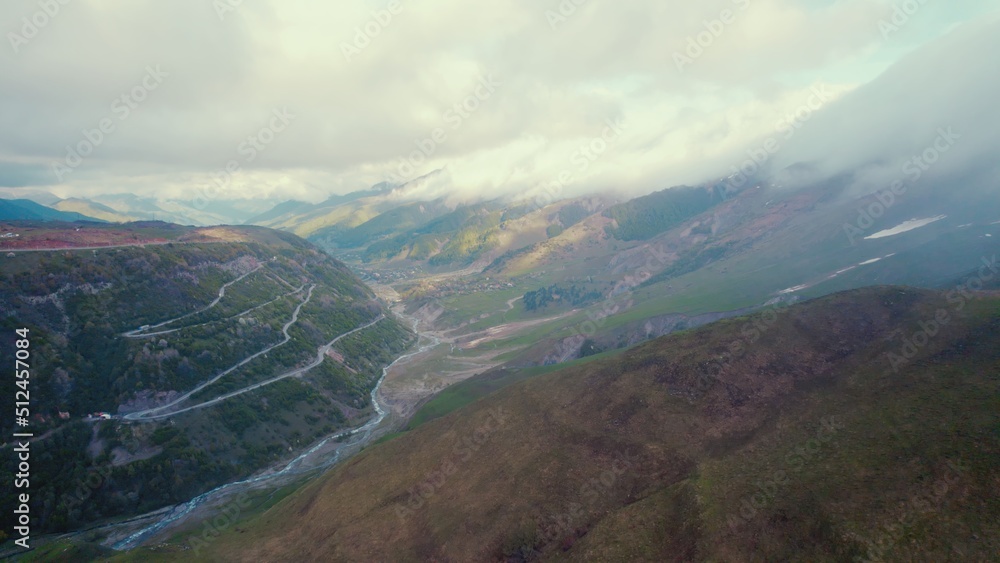 ascending view of foggy and cloudy Caucasus mountains, Georgia, Europe. High quality photo ascending view of foggy and cloudy Caucasus mountains, Georgia, Europe. High quality photo