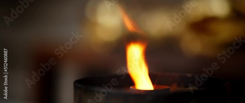 burning candle in the dark