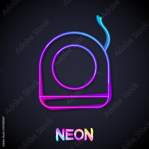 Glowing neon line Dental floss icon isolated on black background. Vector
