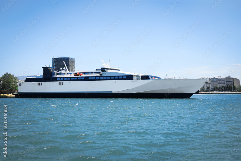 Obraz premium Modern ferry in sea port on sunny day