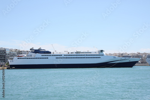 Modern ferry in sea port on sunny day © New Africa