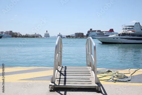 Canvas Print Modern ship gangway on pier in seaport
