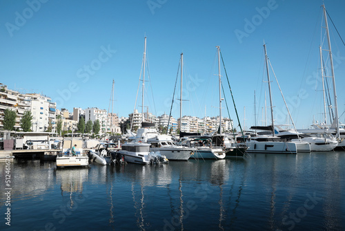 Picturesque view of port with modern boats on sunny day