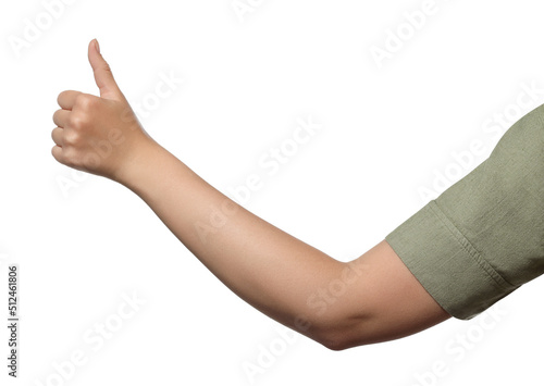 Woman showing hitchhiking gesture on white background, closeup