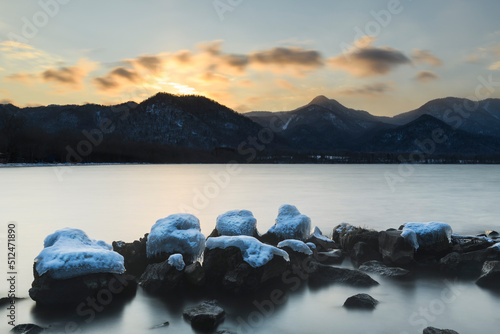 Long exposure sunset view of lake Kussharo from Wakoto Peninsula in winter, Hokkaido, Japan photo