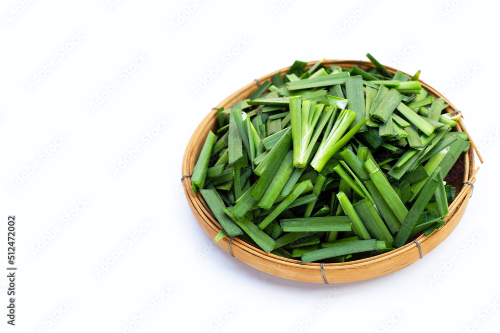 Fresh Chinese Chive leaves on white background. Fresh Chinese Chive leaves on white background.
