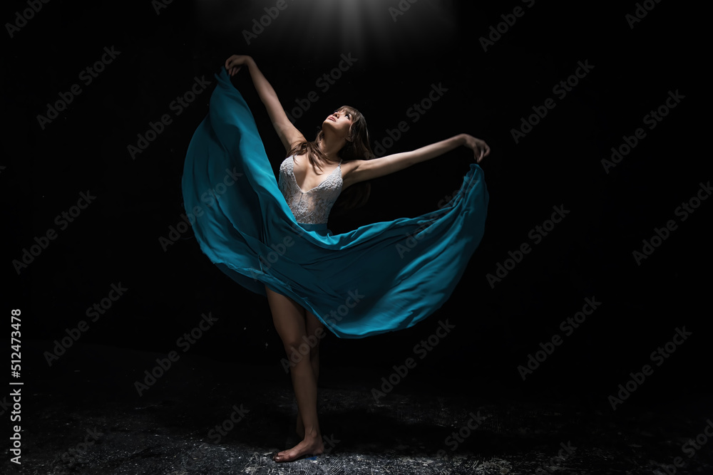 young ballerina with a perfect body is dancing in a photo studio, dancers are dressed in fashionable outfits, this picture is taken in minimal style, showing the beauty of classical art like ballet. - obrazy, fototapety, plakaty 