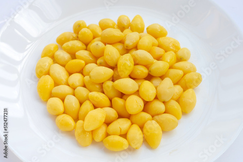 Boiled ginkgo nuts on white background.