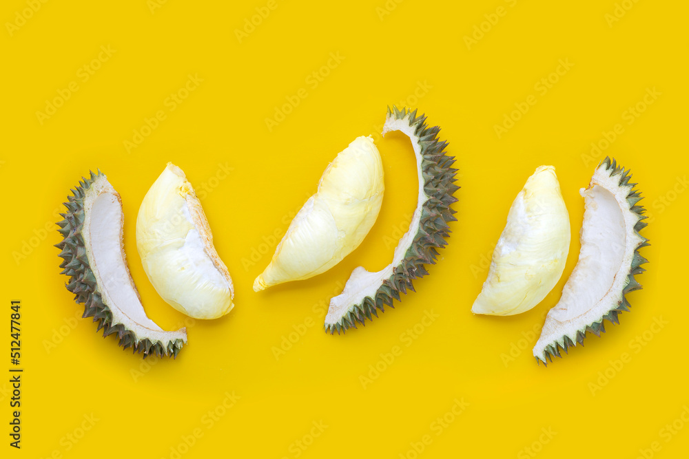 Naklejka premium Durian on yellow background. Top view