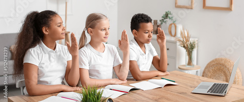 Little children studying on...