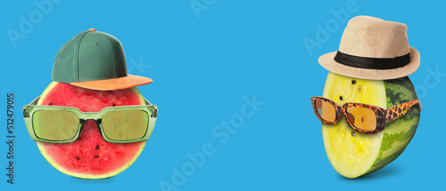 Funny yellow watermelon wearing sunglasses and hat on blue background