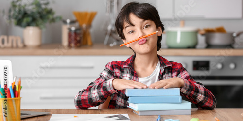 Little boy having fun while...