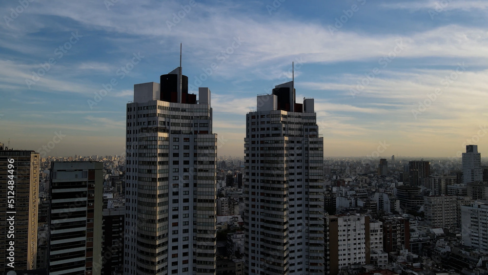 Twin skyscrapers and blue sky in Buenos Aires city at sunset, South America