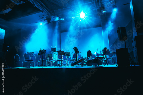 Musical instruments of symphonic orchestra and music stands for music on the concert stage