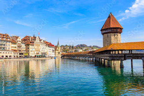Chapel bridge spanning the river Reuss in the city of Lucerne, Switzerland photo