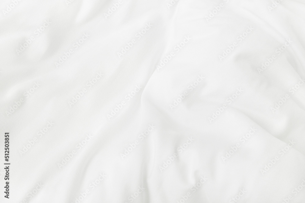 Texture of white blanket and bedding sheet with crumpled or messy in