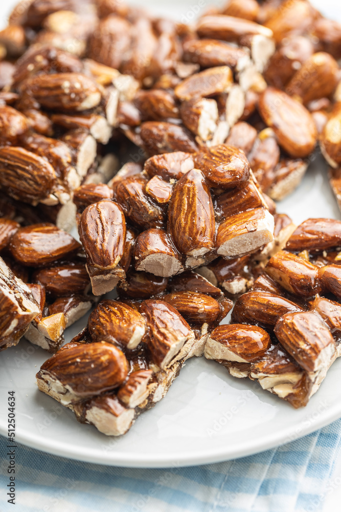 Sweet mini almond bars on plate. Sweet mini almond bars on plate.