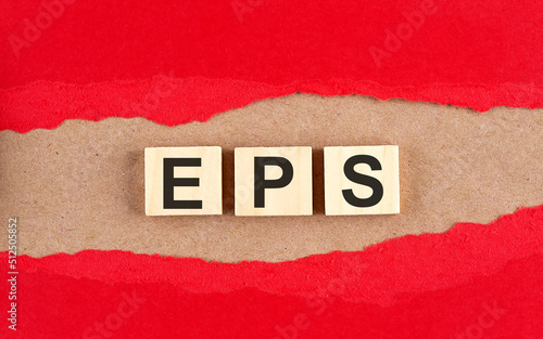EPS word on wooden cubes on red torn paper , financial concept background