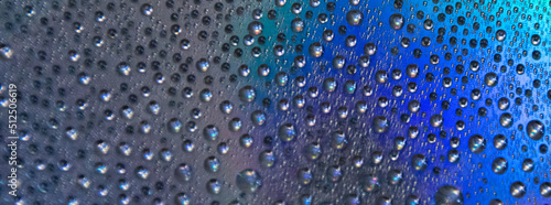 Water drops close up. Bright gradient background with space for text