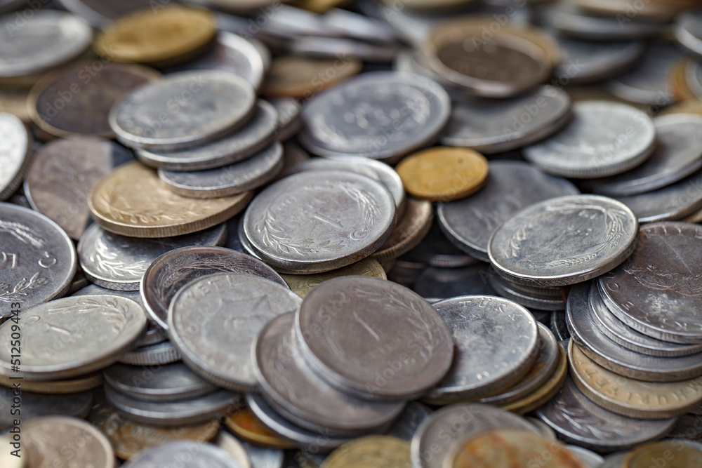 Old coins white and yellow, Turkish lira and other money, set in bulk, selective focus. Old coins white and yellow, Turkish lira and other money, set in bulk, selective focus.
