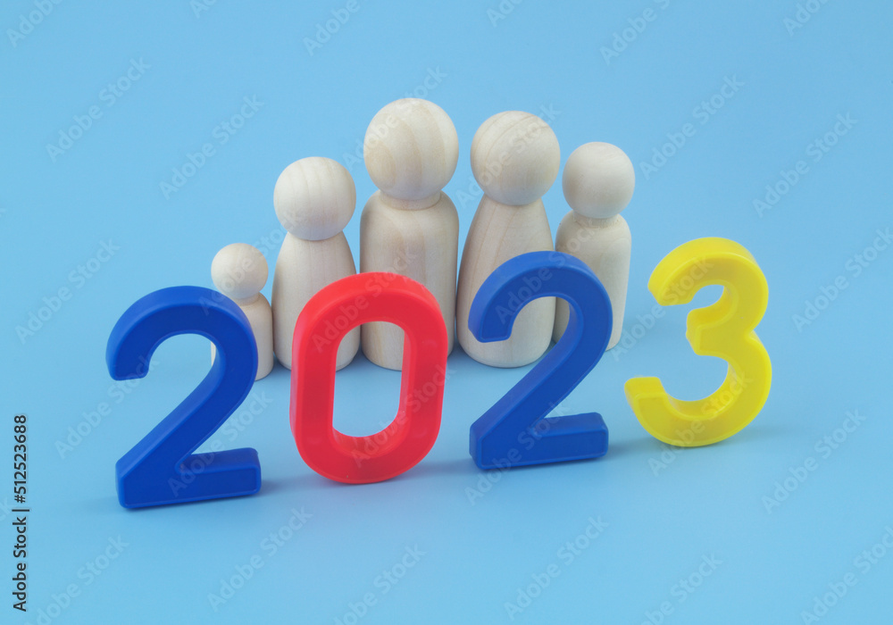 Demography and family in 2023 concept. Wooden people figures of family members and numbers 2023. Demography and family in 2023 concept. Wooden people figures of family members and numbers 2023.