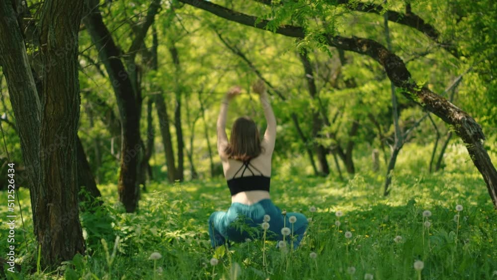 Young girl enjoy the nature, relax freedom and dancing in the forest Young girl enjoy the nature, relax freedom and dancing in the forest