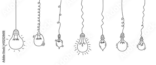 Light bulbs set in doodle style. Hand drawn light bulb icons. Concept of business idea, energy. Vector illustration..