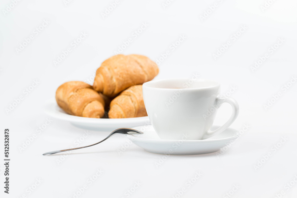 cup of coffee and croissant cup of coffee and croissant