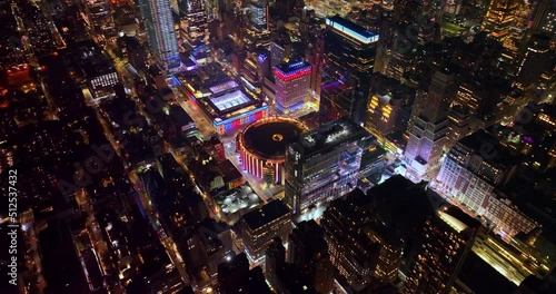 Wonderful round building of Overhaul Penn Station standing out in New York panorama. Fantastic city scenery at night time.