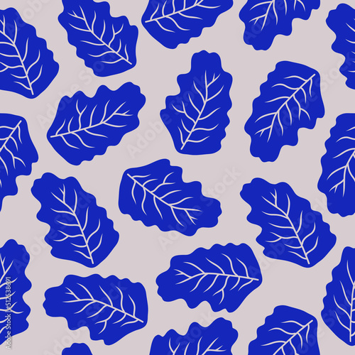 Seamless vector pattern with blue leaves on a beige background